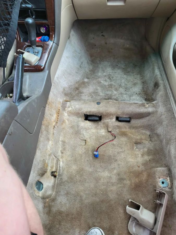 Stained, soiled vehicle carpet