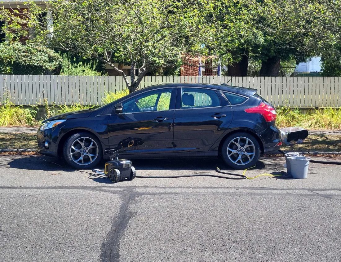 Black Ford Focus mid-wash