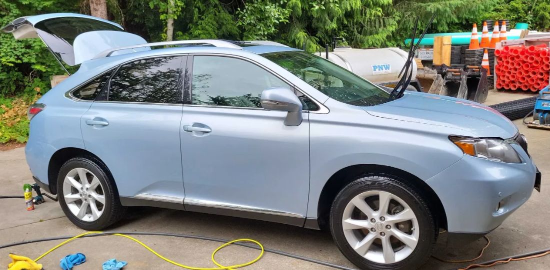 Light blue sedan freshly washed